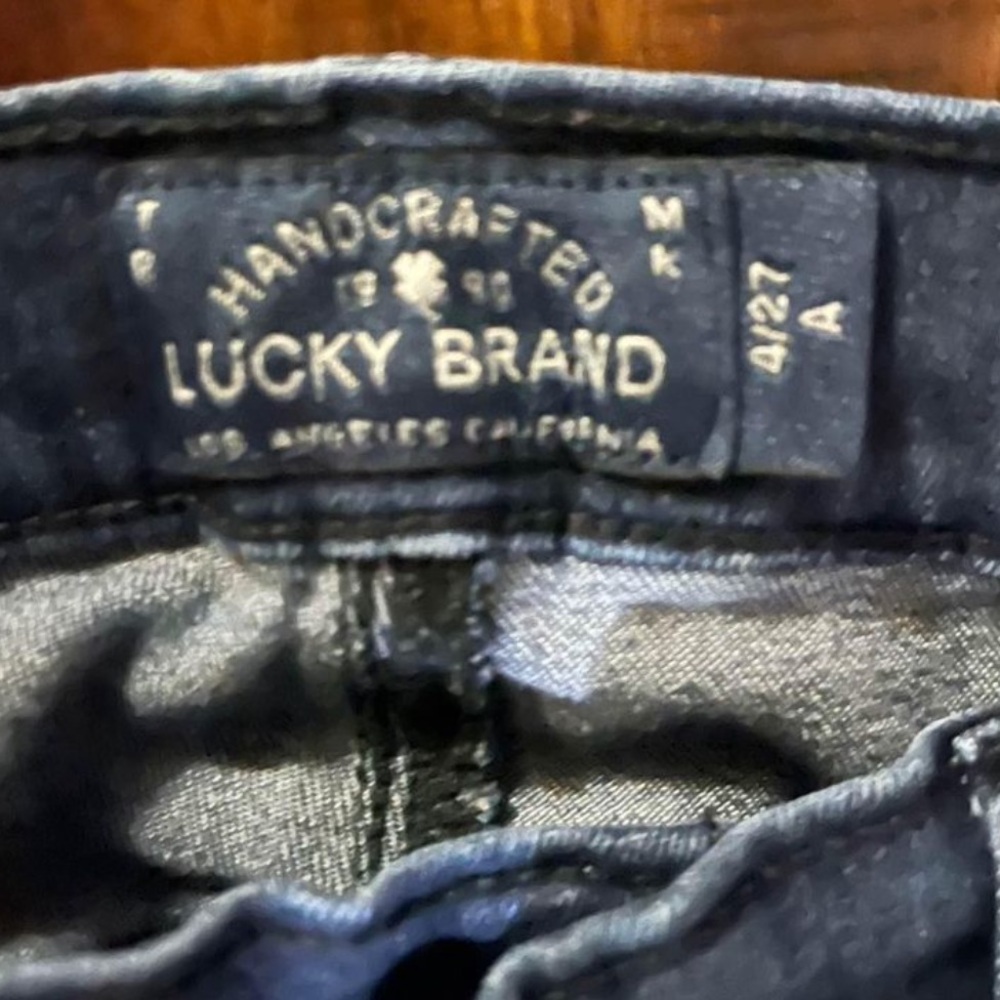 Lucky Brand jeans size 4 jeans.   Dark blue.  Zipper detail.